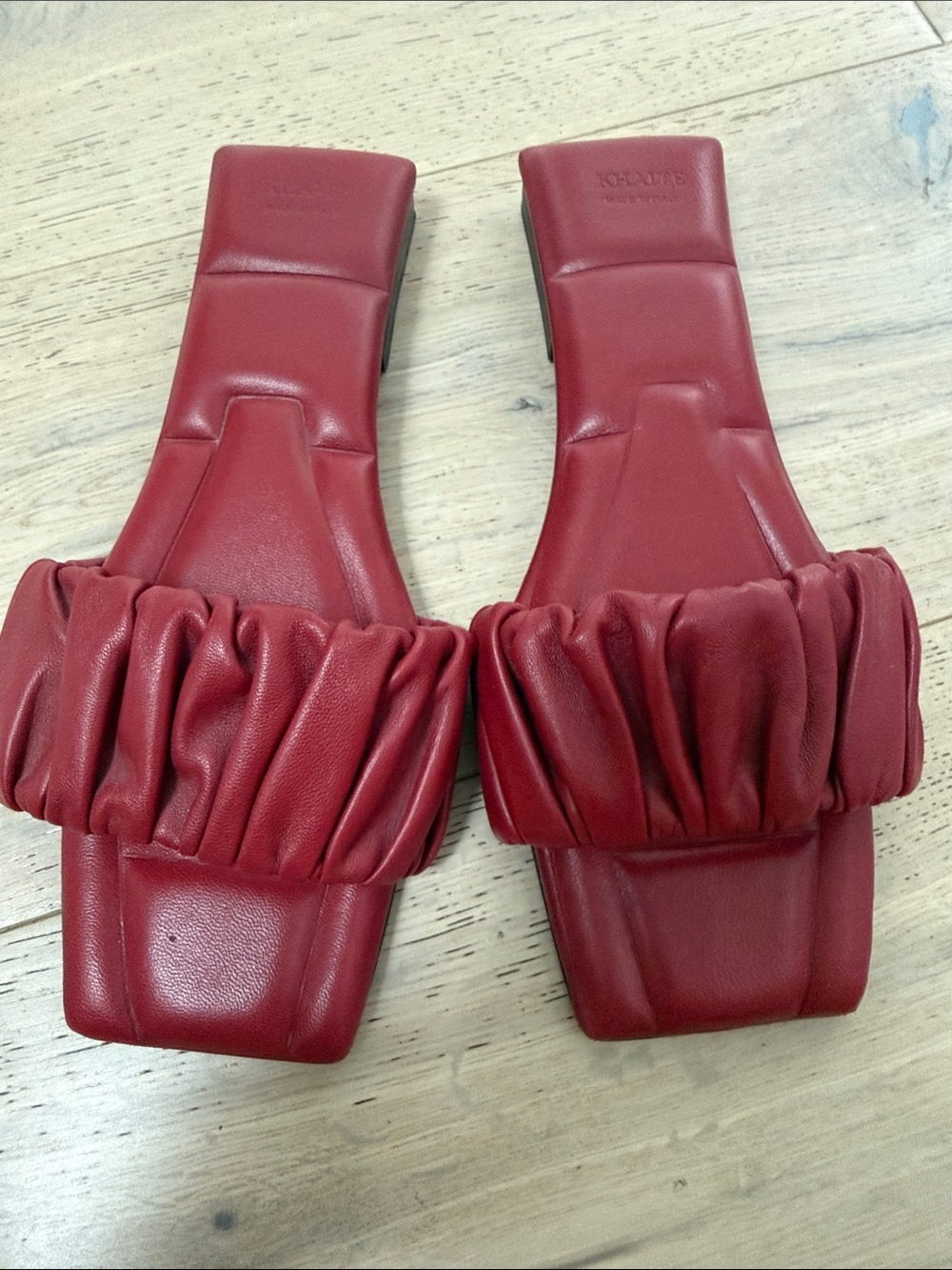Khaite Claret ruched slides